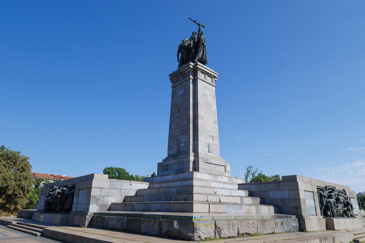 Monument to the Soviet Army with bronze equestrian statue on tall stone pedestal and relief sculptures, Sofia, Bulgaria